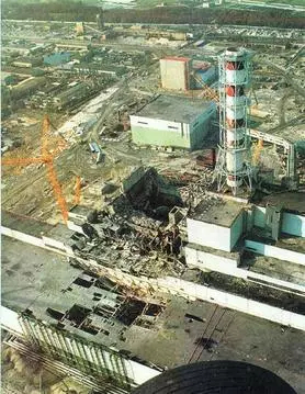 The image shows the scale of the destruction caused by the explosion. Reactor No. 4 (center) and the turbine hall (lower left) suffered extremely severe damage. | Credit: wikizero