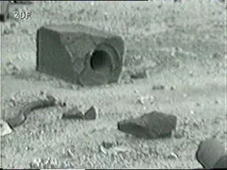 Graphite moderator blocks ejected from the reactor core. The largest graphite block shows a complete control-rod channel. Graphite was a core material in the Chernobyl reactor and is extremely radioactive. | Credit: wikizero